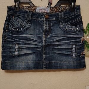AVIVA Blue Denim Mini Skirt with Distressed Accents